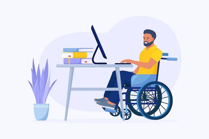 Disabled Man in Wheelchair Working at Computer